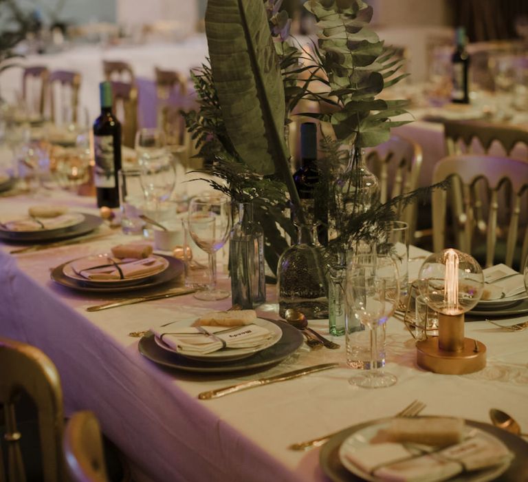 Foliage Stems in Bottles as Centrepieces