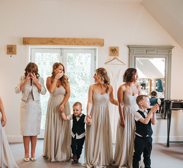 Bridal Party Sees Bride in Dress For First Time