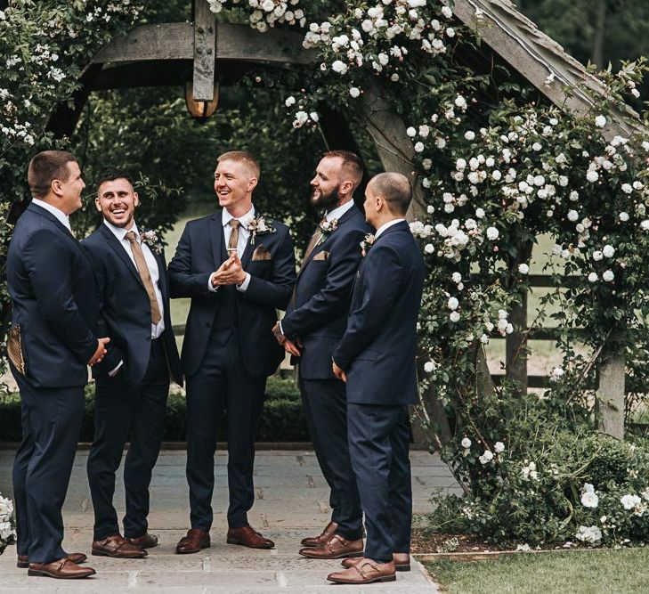 Groomsmen With Groom In Navy Suits and Brown Shoes