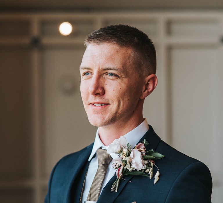 Groom with Buttonhole on Navy Suit