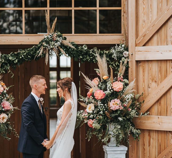 Bride and Groom At Entrance Of Hyde House Venue