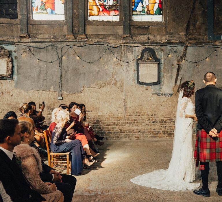 Wedding Ceremony at The Asylum with Bride in Bohemian Rue De Seine Wedding Dress and Groom in Red Tartan Kilt