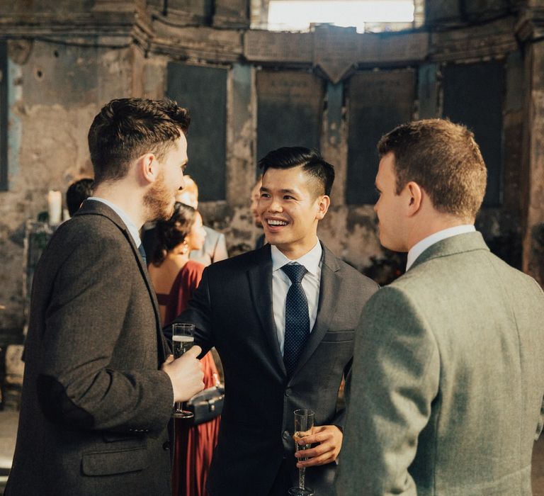 Wedding Guests Enjoying Pre-wedding Drinks in The Asylum Chapel