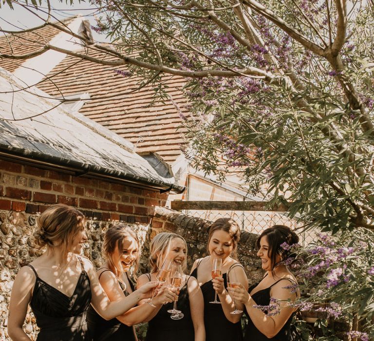 Bridesmaids in black dresses