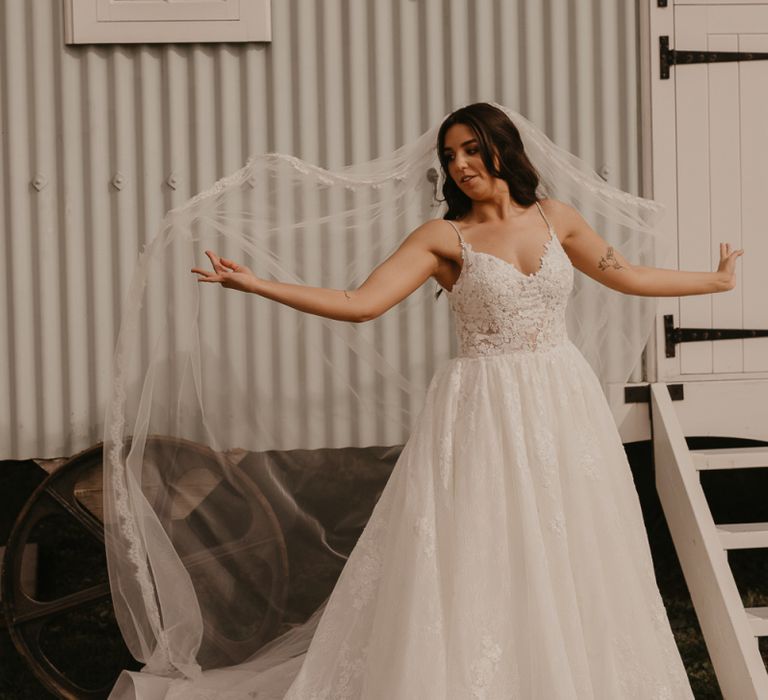 Bride in Enzoani wedding dress at Southend Barns wedding