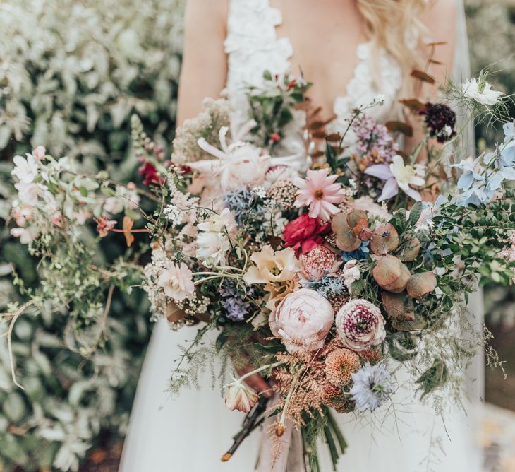 Oversized And Abundant Floral Wedding Bouquet // Disney Princess Bride Sleeping Beauty Inspired Wedding With Opulent Florals And Bride In Blush Pink With Images From Rebecca Carpenter Photography