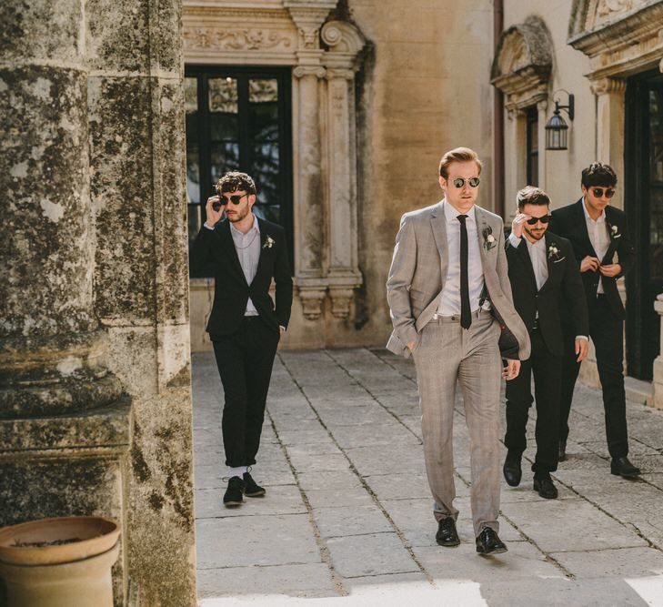 Groomsmen in Black and Grey Check Suits