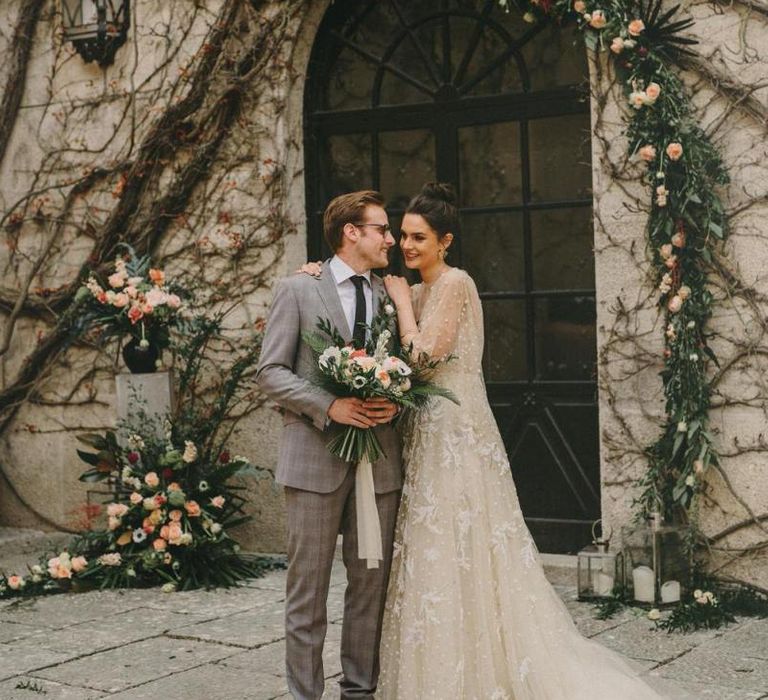 Intimate Bride and Groom Portrait with Bride in Lace Wedding Dress