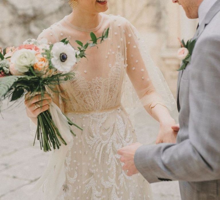 Bride Greets Her Groom at First Look Moment