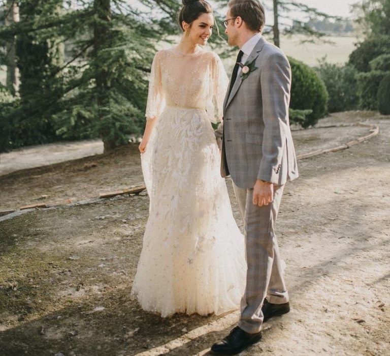 Sunspray Wedding Portrait with Bride in Delicate Lace Wedding Dress