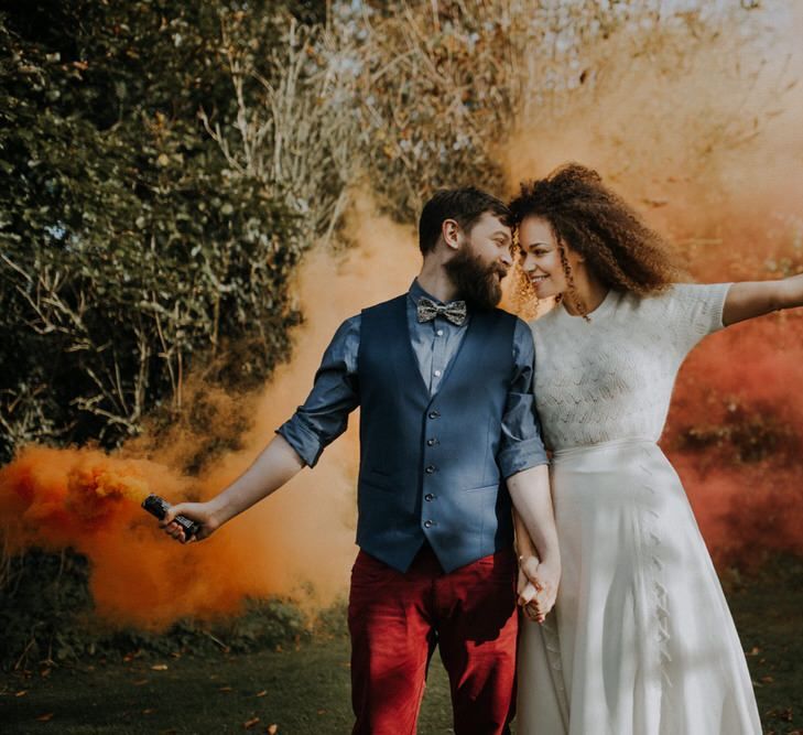 Colourful Smoke Bomb/Flares For Couples Shots At Wedding // Image By Lola Rose Photography