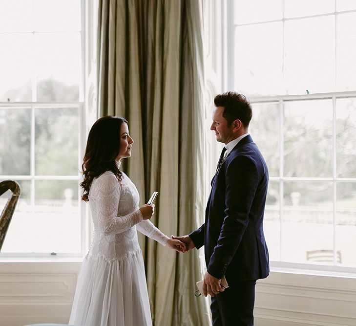 Bride and Groom Saying Their Wedding Vows Next to a Harp