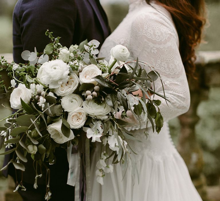 White Rose and Ranunculus Bridal Bouquet with Foliage