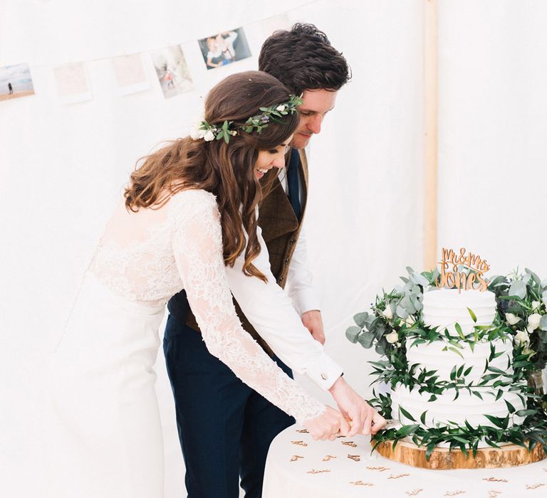 Wedding Cake With White Buttercream And Foliage