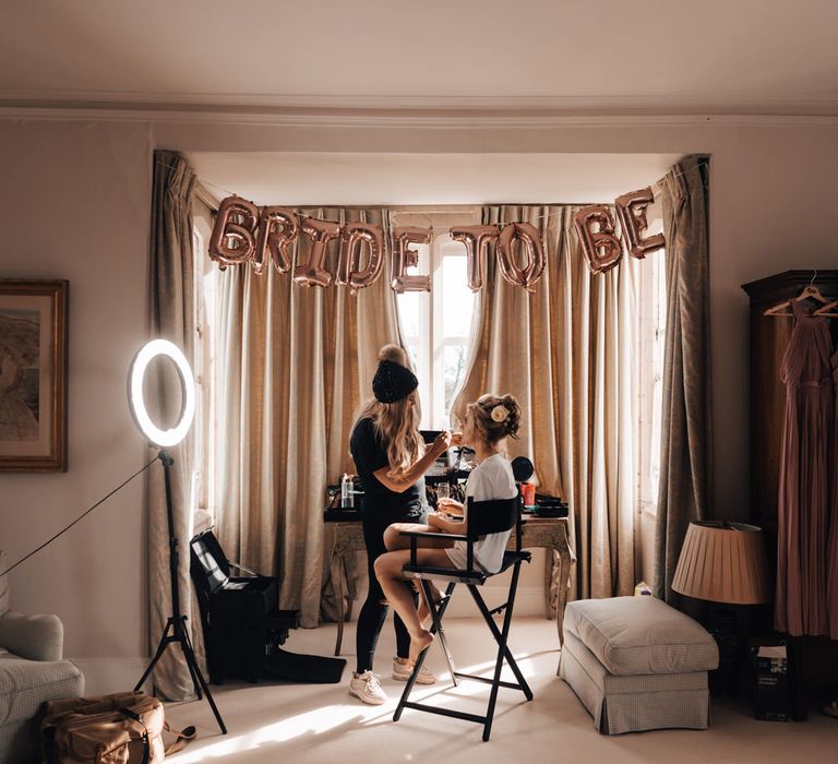 Bridal Makeup with Giant Bride to Be Wedding Balloons