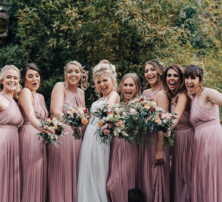 Bridal Party with Bridesmaids in Pink ASOS Dresses and Bride in Stacey by Modeca Wedding Dress