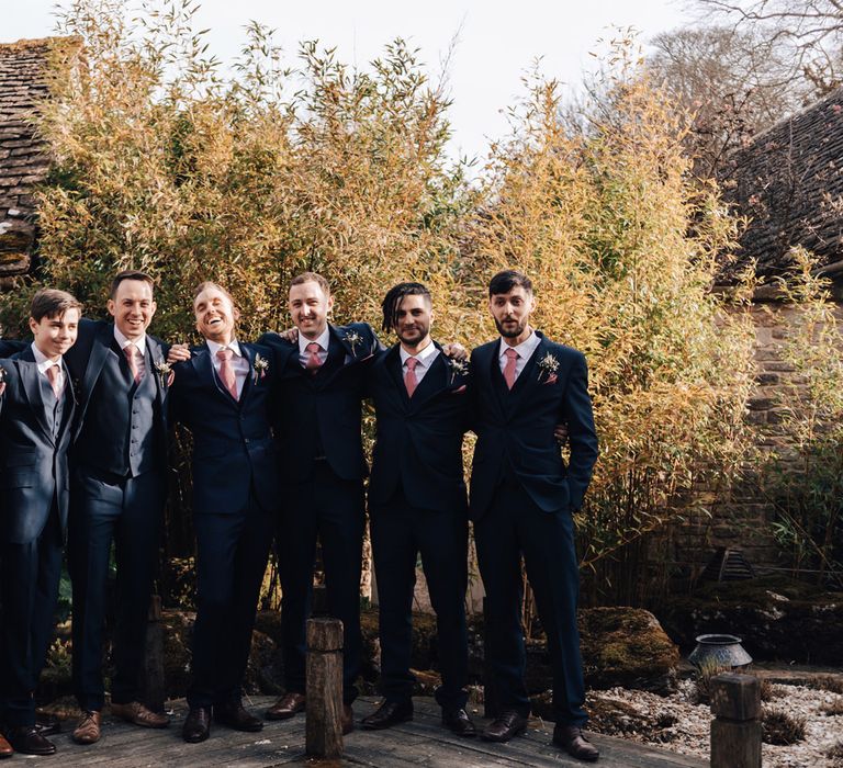 Groomsmen in Navy Blue Charles Tyrwhitt Suits