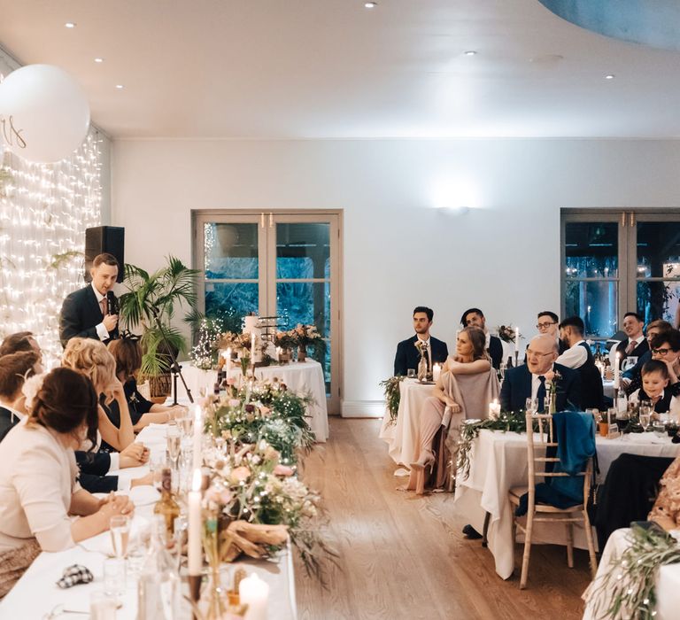 Wedding Reception Speeches at Top Table with Fairy Light Curtain  Backdrop