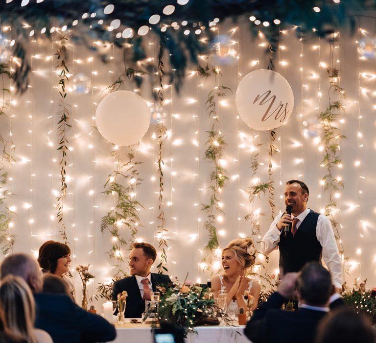 Wedding Reception Speeches at Top Table with Fairy Light Curtain  Backdrop