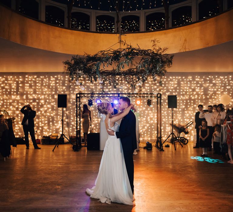 Bride and Groom First Dance with Fairy Light Curtain Dance Floor Backdrop