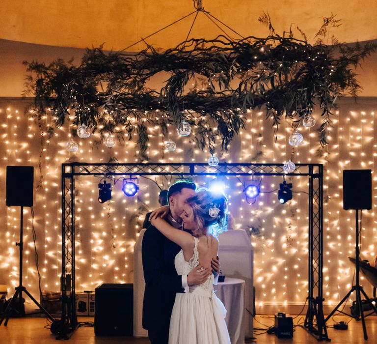 Bride and Groom First Dance with Fairy Light Curtain Dance Floor Backdrop