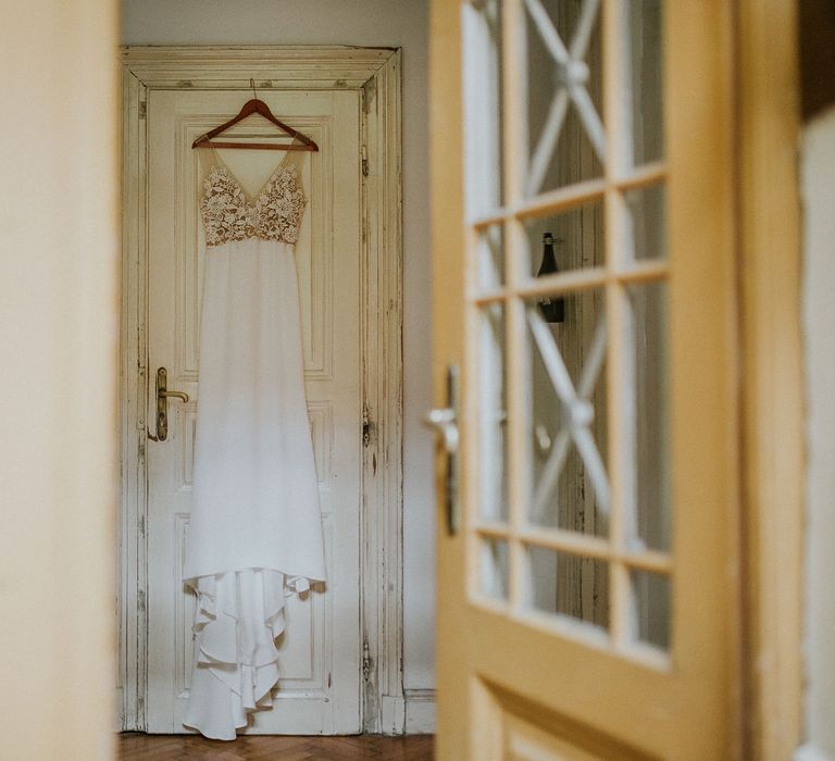 Lila Gown by Alexandra Grecco with Fitted Silk Crepe Skirt and Sheer Italian Tulle Bodice Covered in Floral Lace Applique | Budapest Wedding with Giant Bridal Bouquet, Tuk Tuks and Cadillac | Jágity Fanni Fotográfus