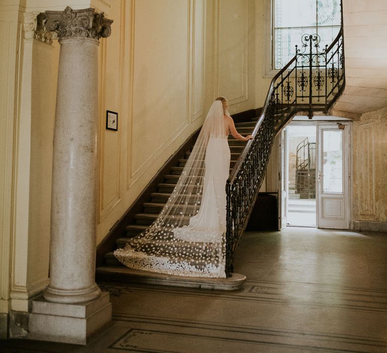 Bride in Lila Gown by Alexandra Grecco with Fitted Silk Crepe Skirt and Sheer Italian Tulle Bodice Covered in Floral Lace Applique | Theia Bridal Veil with Petal Detail | Brody House  Hotel | Budapest Wedding with Giant Bridal Bouquet, Tuk Tuks and Cadillac | Jágity Fanni Fotográfus