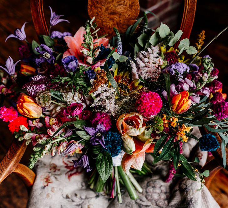 Oversized Colourful Bridal Bouquet | Colourful Alternative Winter Wedding at Upwaltham Barns, Sussex | Epic Love Story Photography