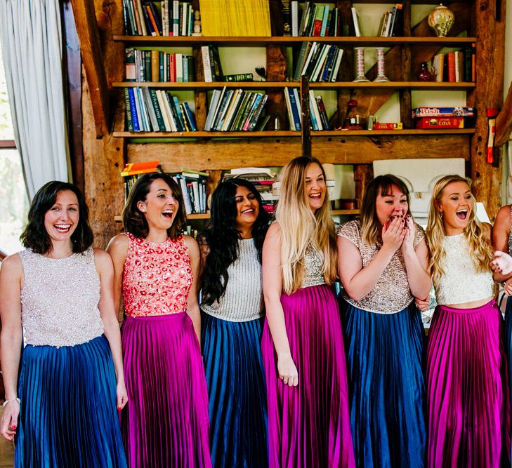 Bridesmaids in Jewel Coloured Skirts &amp; Sequin Top Separates | Colourful Alternative Winter Wedding at Upwaltham Barns, Sussex | Epic Love Story Photography