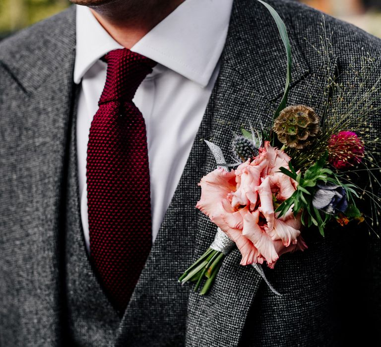 Winter Buttonhole | Colourful Alternative Winter Wedding at Upwaltham Barns, Sussex | Epic Love Story Photography