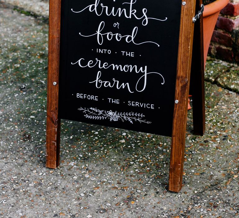 Chalkboard Wedding Sign | Colourful Alternative Winter Wedding at Upwaltham Barns, Sussex | Epic Love Story Photography