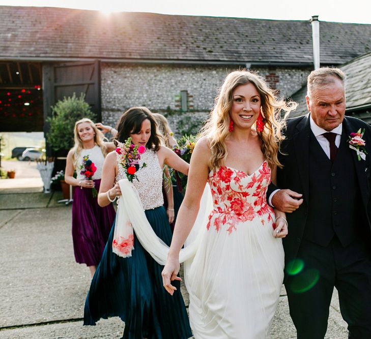 Bridal Entrance in Red &amp; White Joanne Fleming Design Wedding Dress | Colourful Alternative Winter Wedding at Upwaltham Barns, Sussex | Epic Love Story Photography