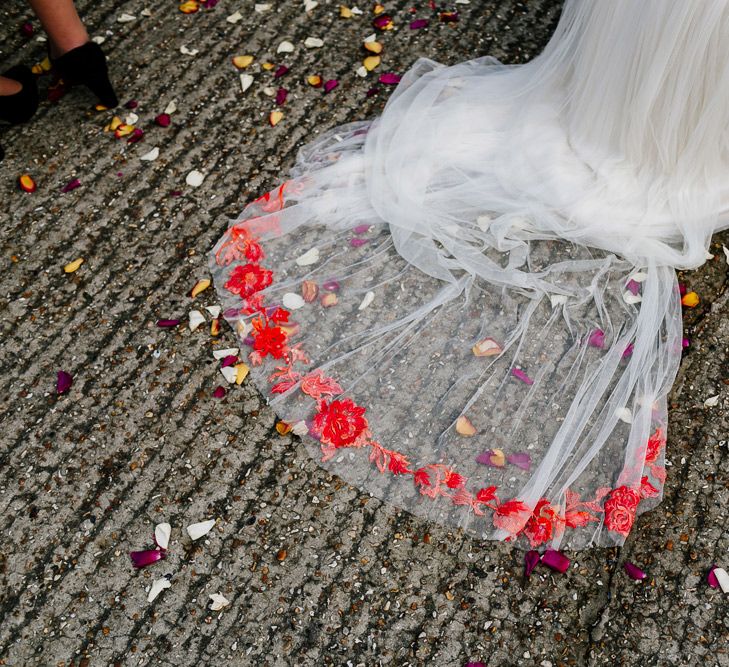 Confetti Moment |  Bride in Red &amp; White Joanne Fleming Design Wedding Dress | Colourful Alternative Winter Wedding at Upwaltham Barns, Sussex | Epic Love Story Photography