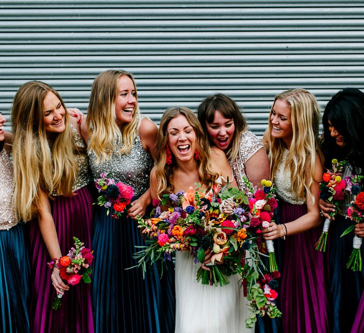 Bridal Party | Bride in Red &amp; White Joanne Fleming Design Wedding Dress | Bridesmaids in Jewel Coloured Skirts &amp; Sequin Top Separates | Colourful Alternative Winter Wedding at Upwaltham Barns, Sussex | Epic Love Story Photography