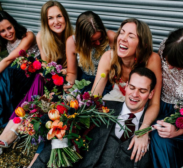 Bridal Party | Bride in Red &amp; White Joanne Fleming Design Wedding Dress | Bridesmaids in Jewel Coloured Skirts &amp; Sequin Top Separates | Colourful Alternative Winter Wedding at Upwaltham Barns, Sussex | Epic Love Story Photography