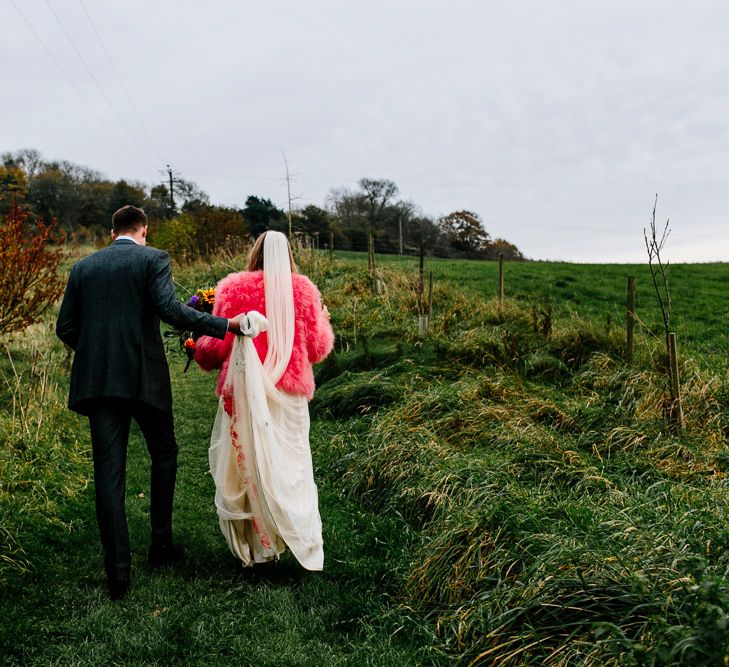 Bride in Red &amp; White Joanne Fleming Design Wedding Dress | Groom in Suit Supply Suit | Colourful Alternative Winter Wedding at Upwaltham Barns, Sussex | Epic Love Story Photography