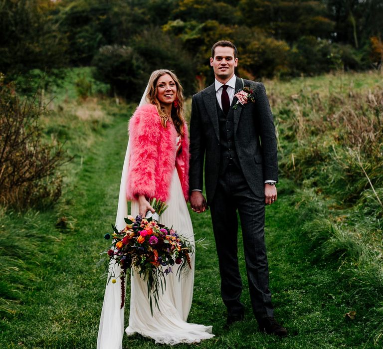 Bride in Red &amp; White Joanne Fleming Design Wedding Dress | Groom in Suit Supply Suit | Colourful Alternative Winter Wedding at Upwaltham Barns, Sussex | Epic Love Story Photography