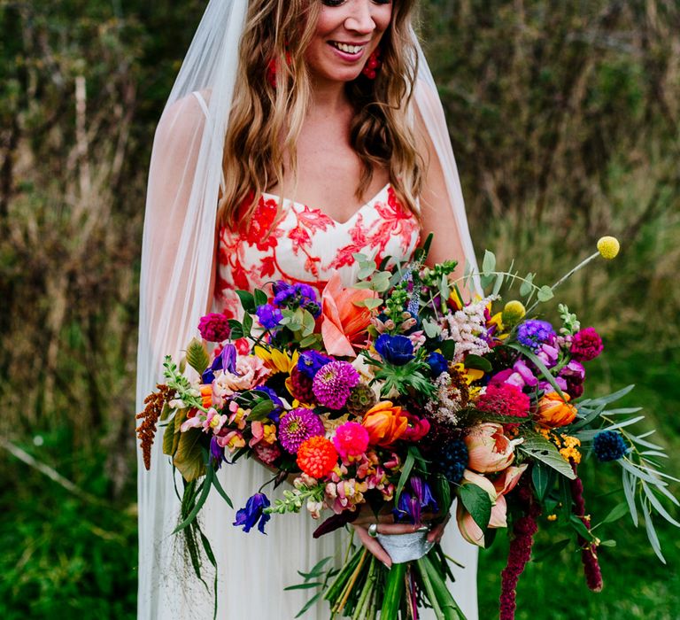 Bride in Red &amp; White Joanne Fleming Design Wedding Dress | Colourful Alternative Winter Wedding at Upwaltham Barns, Sussex | Epic Love Story Photography