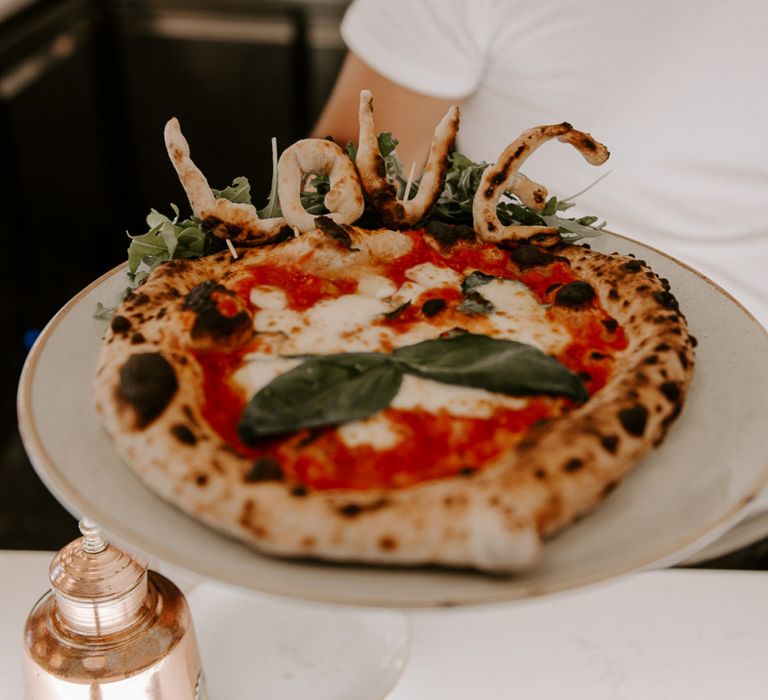 Pizza making for intimate wedding reception at Italian restaurant