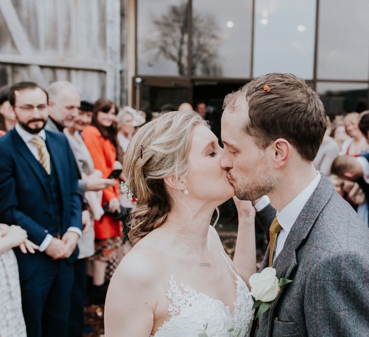 Bride in Essense of Australia Gown | Groom in  Grey Suit | Gold, Grey &amp; Green Rustic Wedding at The Gilbert White’s 16th Century Hampshire Barn | Joasis Photography