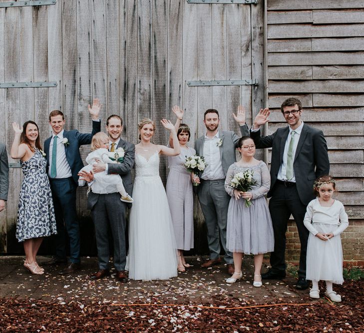 Wedding Party | Bride in Essense of Australia Gown | Groom in  Grey Suit | Gold, Grey &amp; Green Rustic Wedding at The Gilbert White’s 16th Century Hampshire Barn | Joasis Photography