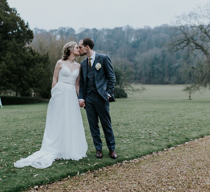 Bride in Essense of Australia Gown | Groom in  Grey Suit | Gold, Grey &amp; Green Rustic Wedding at The Gilbert White’s 16th Century Hampshire Barn | Joasis Photography