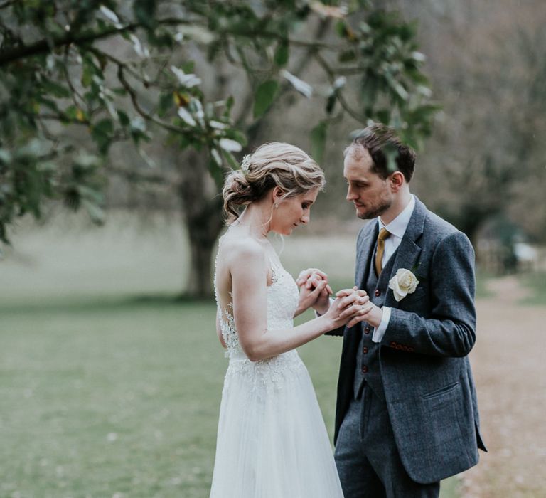 Bride in Essense of Australia Gown | Groom in  Grey Suit | Gold, Grey &amp; Green Rustic Wedding at The Gilbert White’s 16th Century Hampshire Barn | Joasis Photography