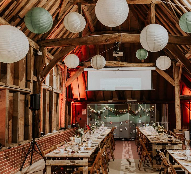 Hanging Paper Lanterns | Gold, Grey &amp; Green Rustic Wedding at The Gilbert White’s 16th Century Hampshire Barn | Joasis Photography