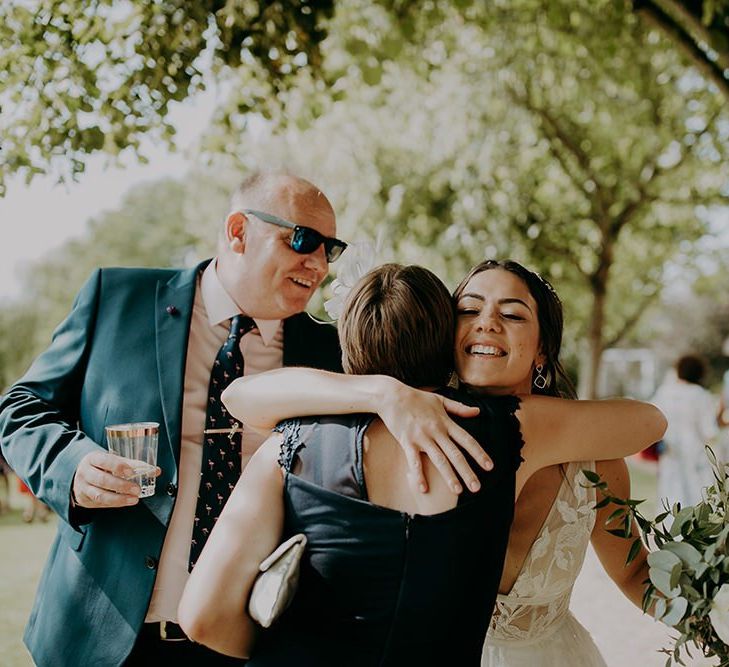 Bride greets guests