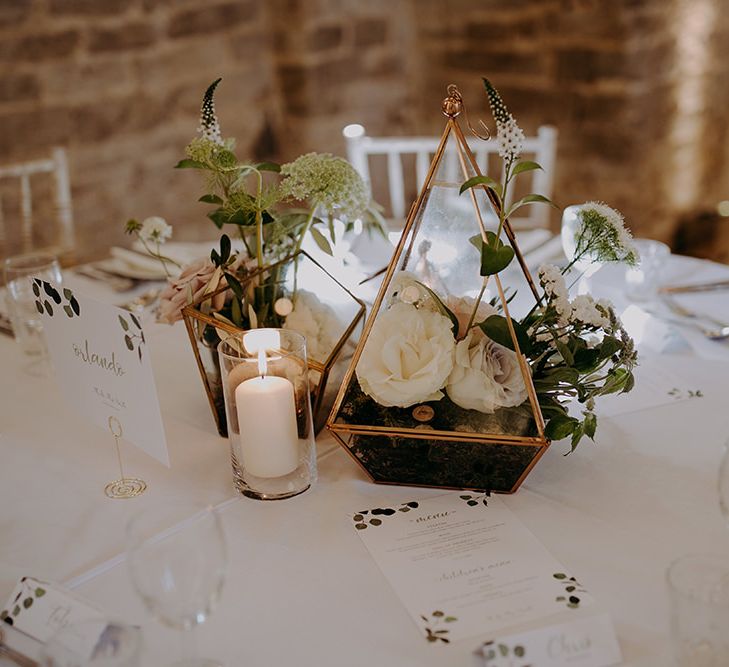 Wedding table decor with flowers and candles