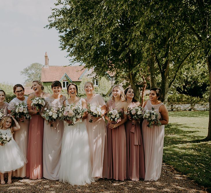 Mismatched blush bridesmaid dresses