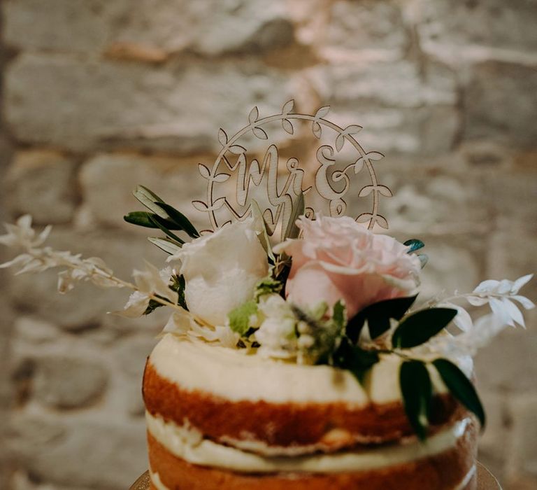 M&amp;S wedding cake with flower decor