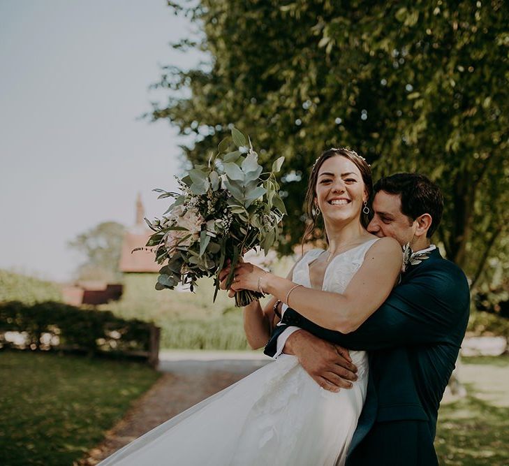 Bride and groom at Tithe Barn Petersfield