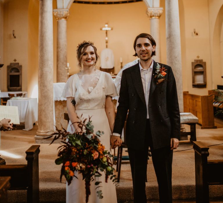 Bride and Groom at the Church Altar